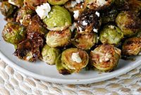 Roasted Brussels Sprouts with Tangy Goat Cheese and Balsamic Glaze
