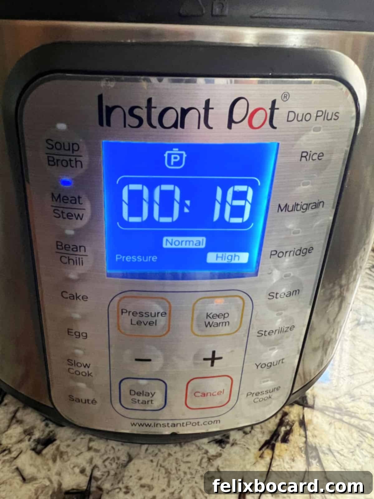 Instant Pot display showing the 'Meat/Stew' setting for 18 minutes on high pressure.