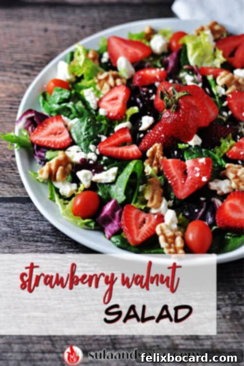 Pinterest pin for strawberry walnut salad featuring a beautifully styled salad