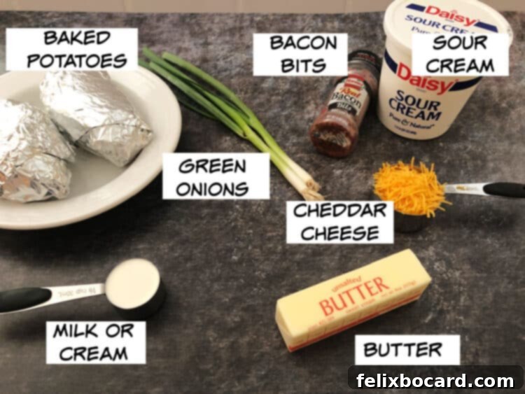 Ingredients laid out: baked potato, bacon bits, green onions, sour cream, cheddar cheese, butter, and milk or cream