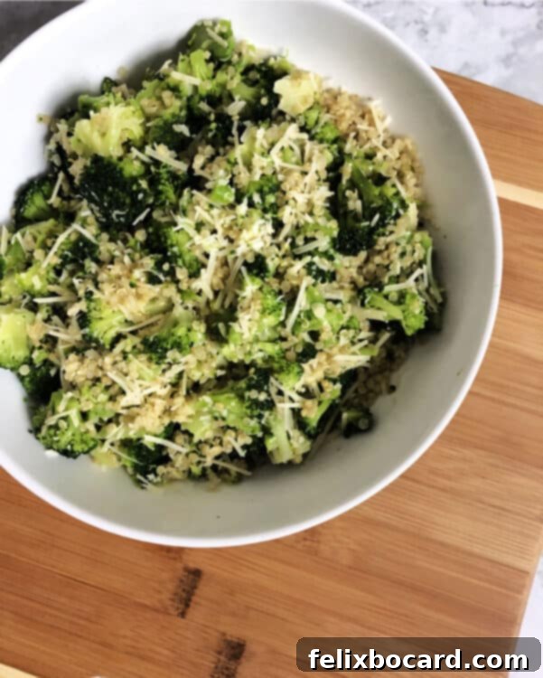 Savory Quinoa with Broccoli and Parmesan 2 quinoa broccoli parmesan in a white bowl on a cutting board