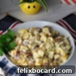 Creamy Red Potato Salad 12 Red skin potato salad in a serving bowl.