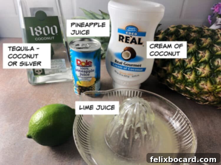 Key ingredients for Coconut Pineapple Margarita: a bottle of tequila, a carton of pineapple juice, a can of cream of coconut, and fresh limes.