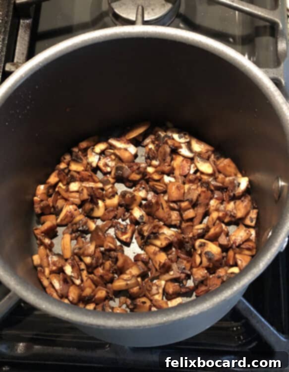 mushrooms cooking in a pot