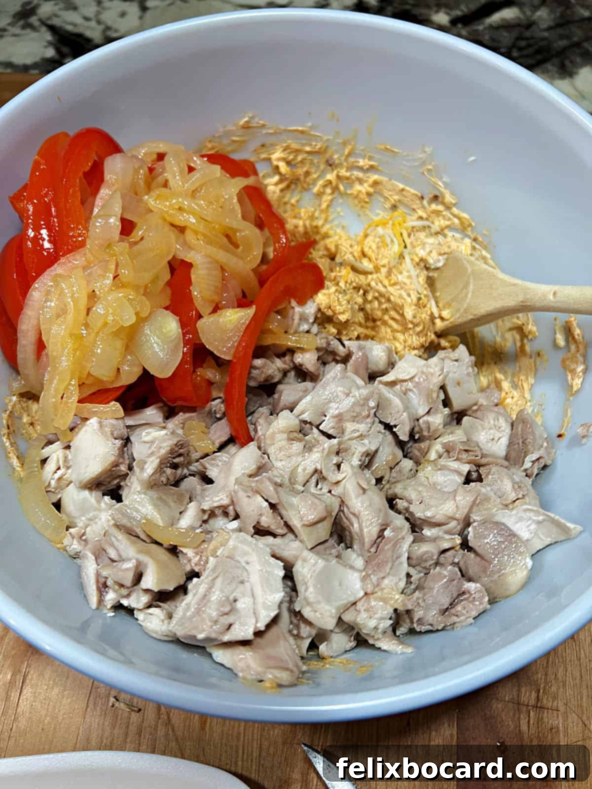 all casserole ingredients in a mixing bowl.