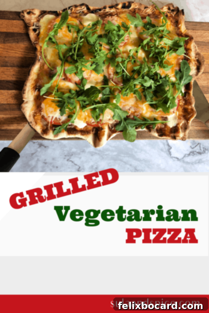 Delicious vegetarian grilled pizza with fresh tomatoes, mozzarella, and a sprinkling of fresh arugula, beautifully charred crust visible.