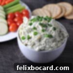 Bold Artichoke Jalapeno Dip 7 jalapeno artichoke dip in a white bowl