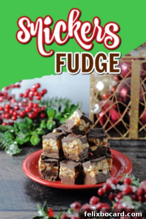 A Pinterest-friendly image for Snickers fudge, featuring beautifully cut squares of fudge with the recipe title and key ingredients for easy sharing and saving.