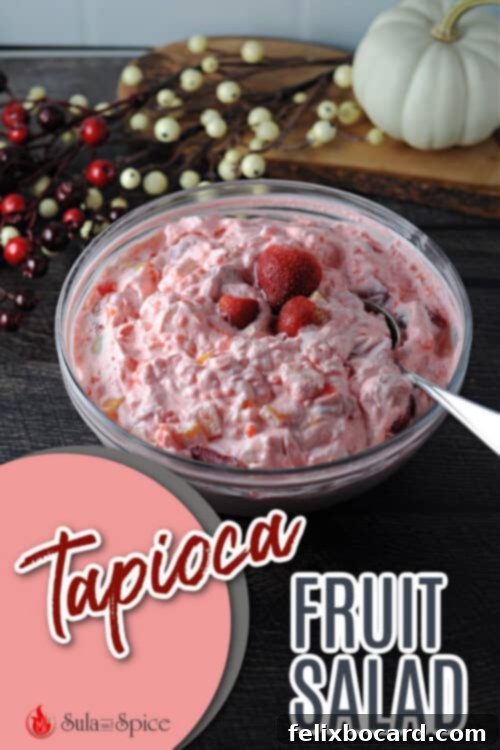 Tapioca Fruit Salad in a decorative serving bowl, with a vintage-style pin design.