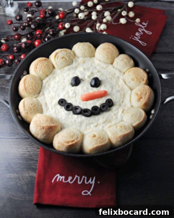 Festive Snowman Dip surrounded by holiday decorations, ready to be served