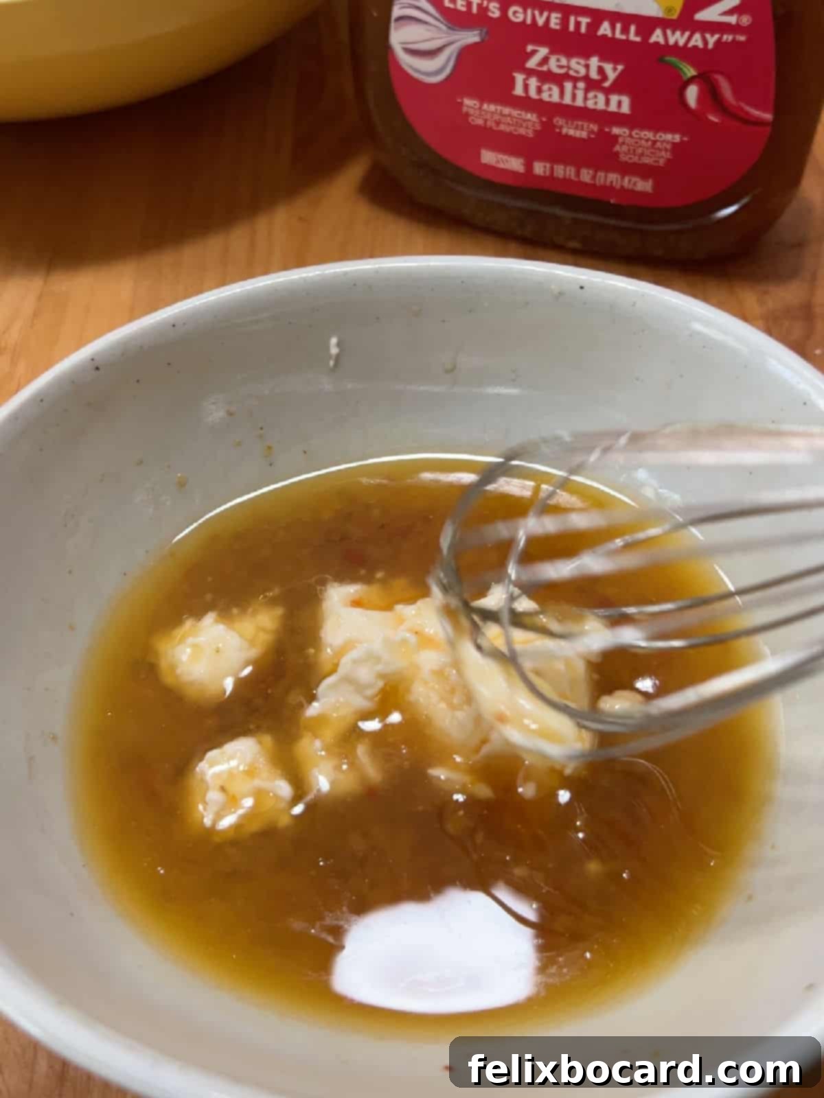 Effortless Pasta Salad 5 Mixing mayo and bottled Italian dressing.