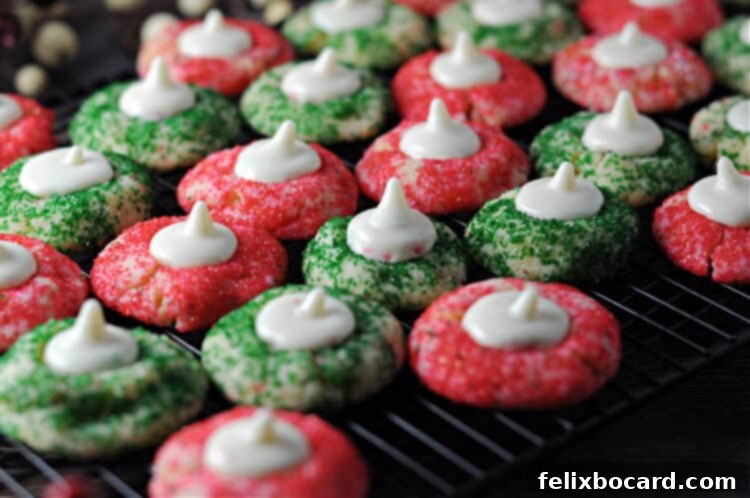 Delicate Sugar Blooms 7 A vibrant holiday tray showcasing a collection of red and green sugar cookie blossoms, perfect for festive celebrations.