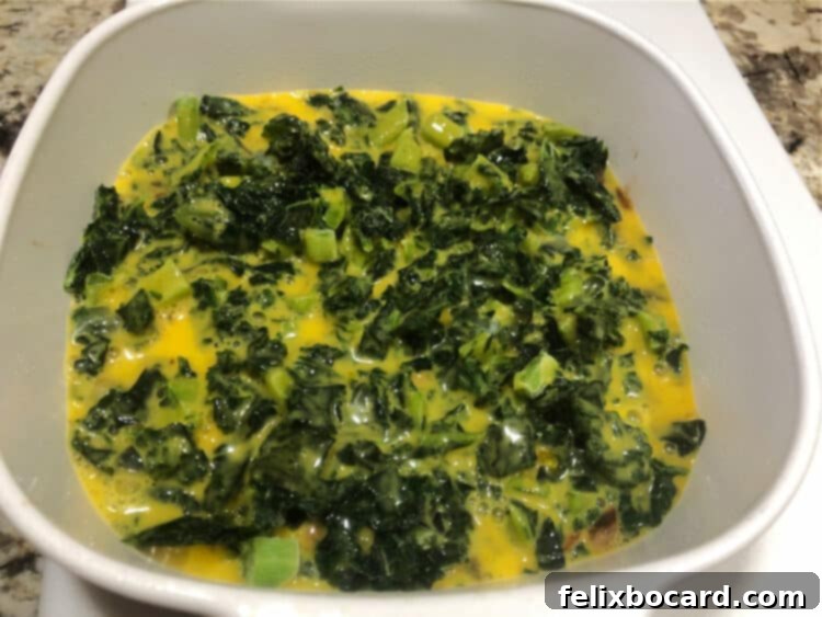 Keto Breakfast Casserole with Spinach, Bacon, and Eggs 5 spinach and eggs added to dish