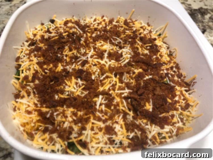 Keto Breakfast Casserole with Spinach, Bacon, and Eggs 6 topping of cheese and bacon bits