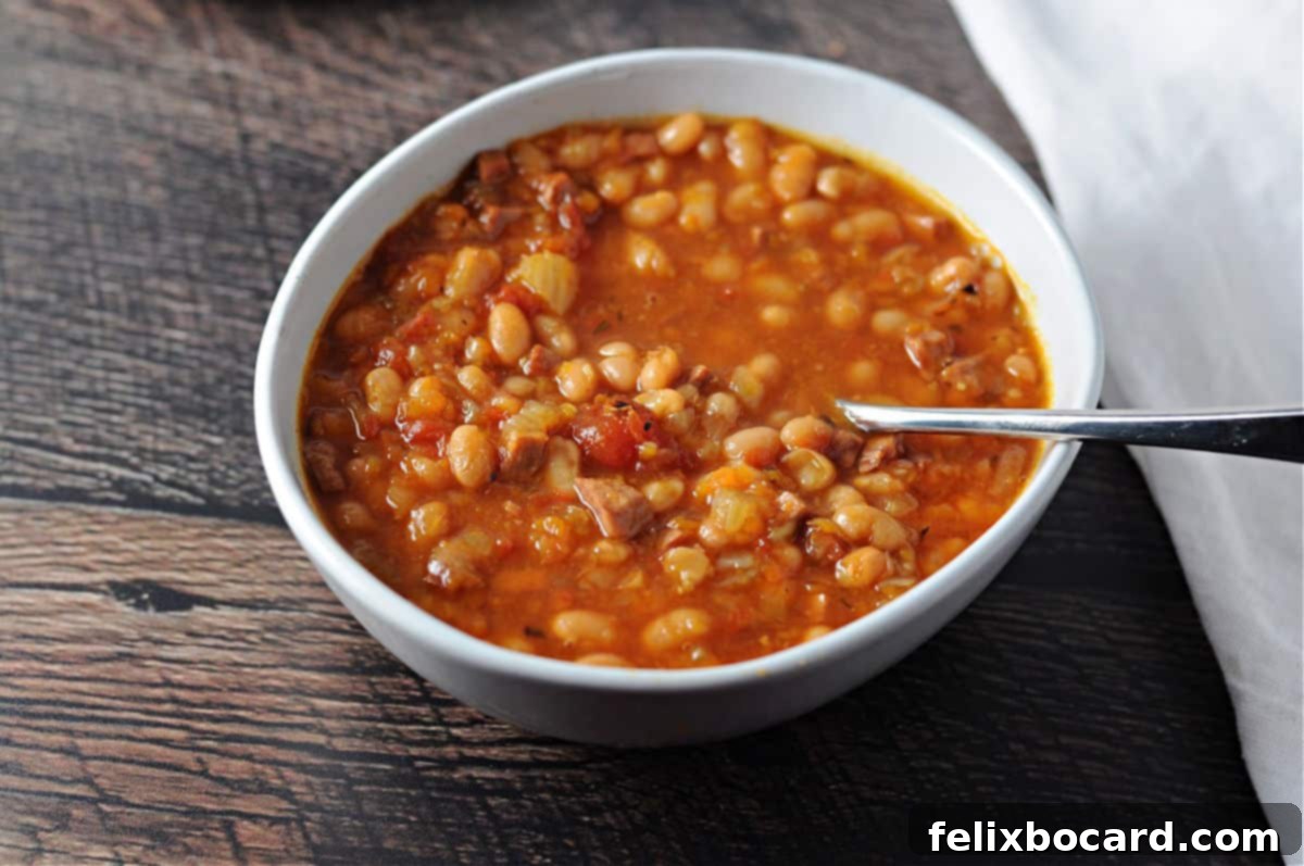 Hearty Instant Pot Ham and Navy Bean Soup 2 bowl of navy bean soup with ham made in the Instant Pot.