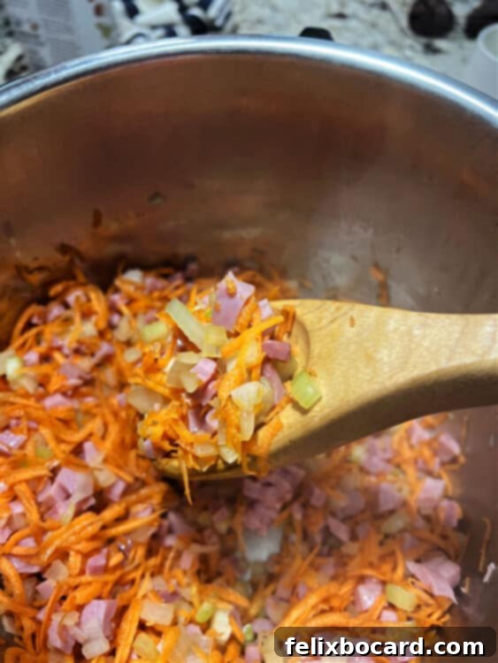 Hearty Instant Pot Ham and Navy Bean Soup 4 saute vegetables with ham