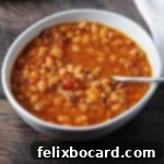 Hearty Instant Pot Ham and Navy Bean Soup 10 bowl of navy bean with ham soup
