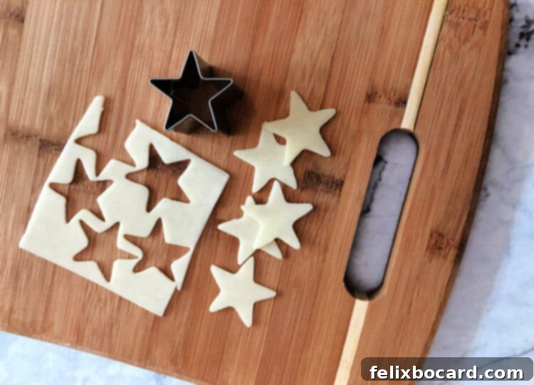 star cookie cutter making star shapes of cheese slices