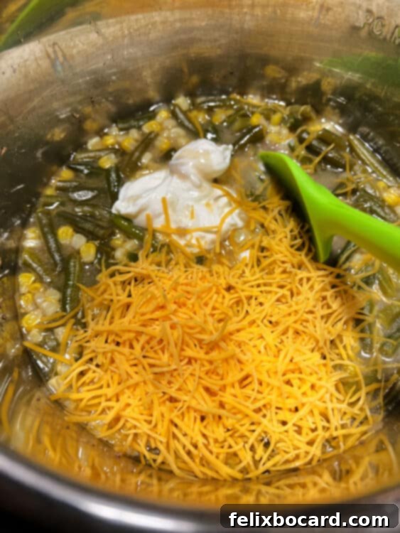 add cheese and sour cream to the cooked mixture.