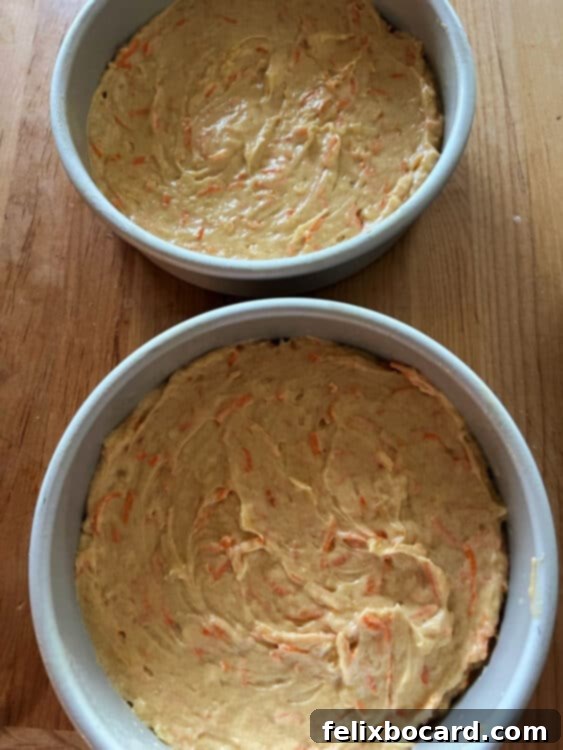 carrot cake batter in the pans.