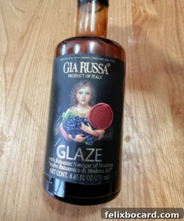 Bottle of high-quality store-bought balsamic glaze.