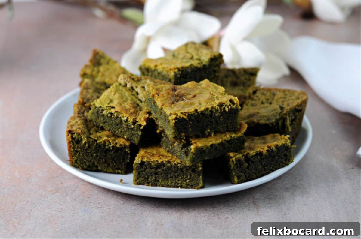 plate of matcha brownies cut in squares.