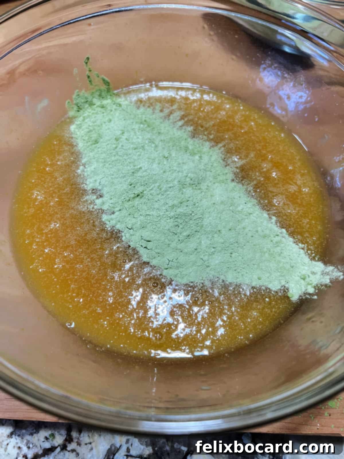 adding dry mix to the wet ingredients.