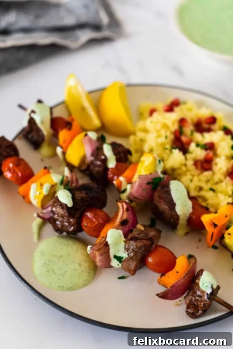 Flavorful grilled Za'atar beef kabobs paired with rainbow vegetables, perfect for the whole family.