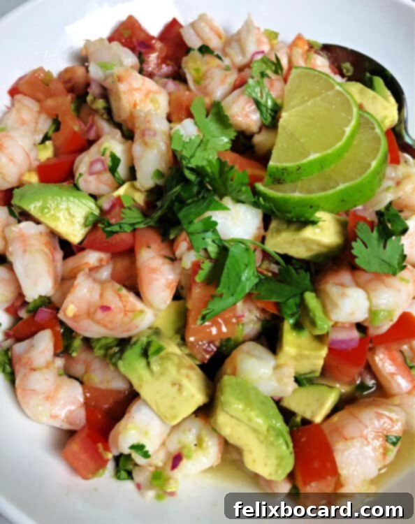close up of lime shrimp avocado salad in a bowl