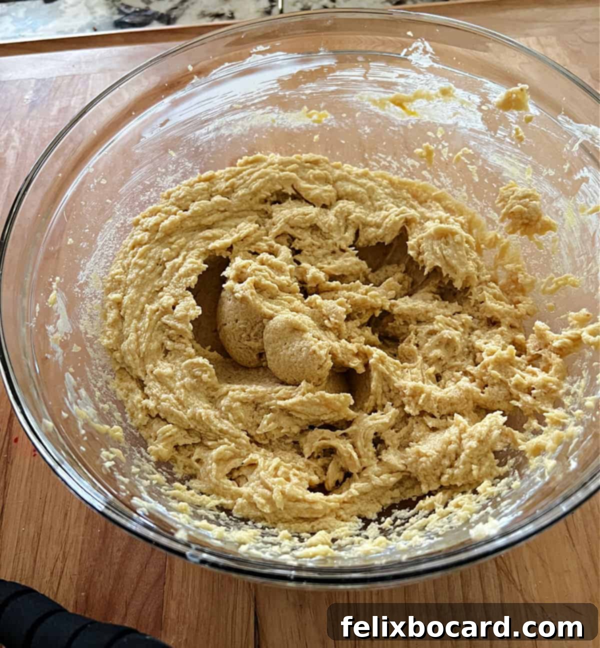 Bowl of cookie batter, ready for dry ingredients.