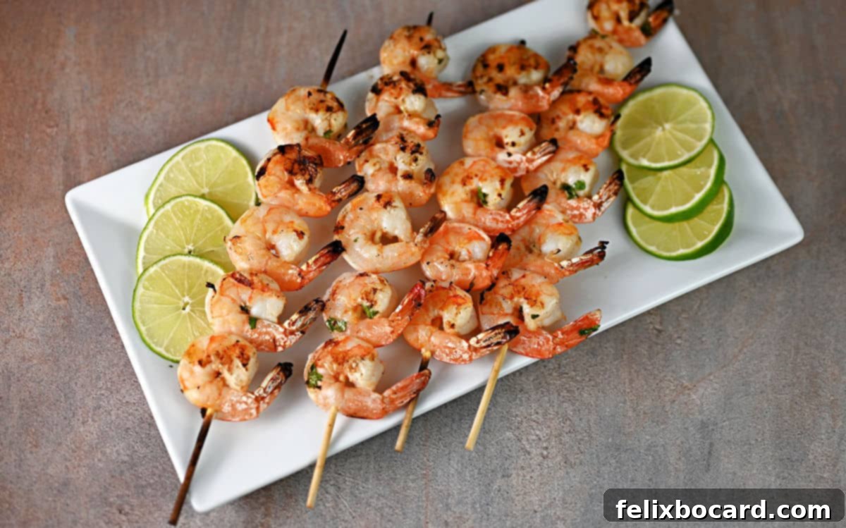 Fiesta Lime Grilled Shrimp Skewers 2 serving tray of grilled margarita shrimp.