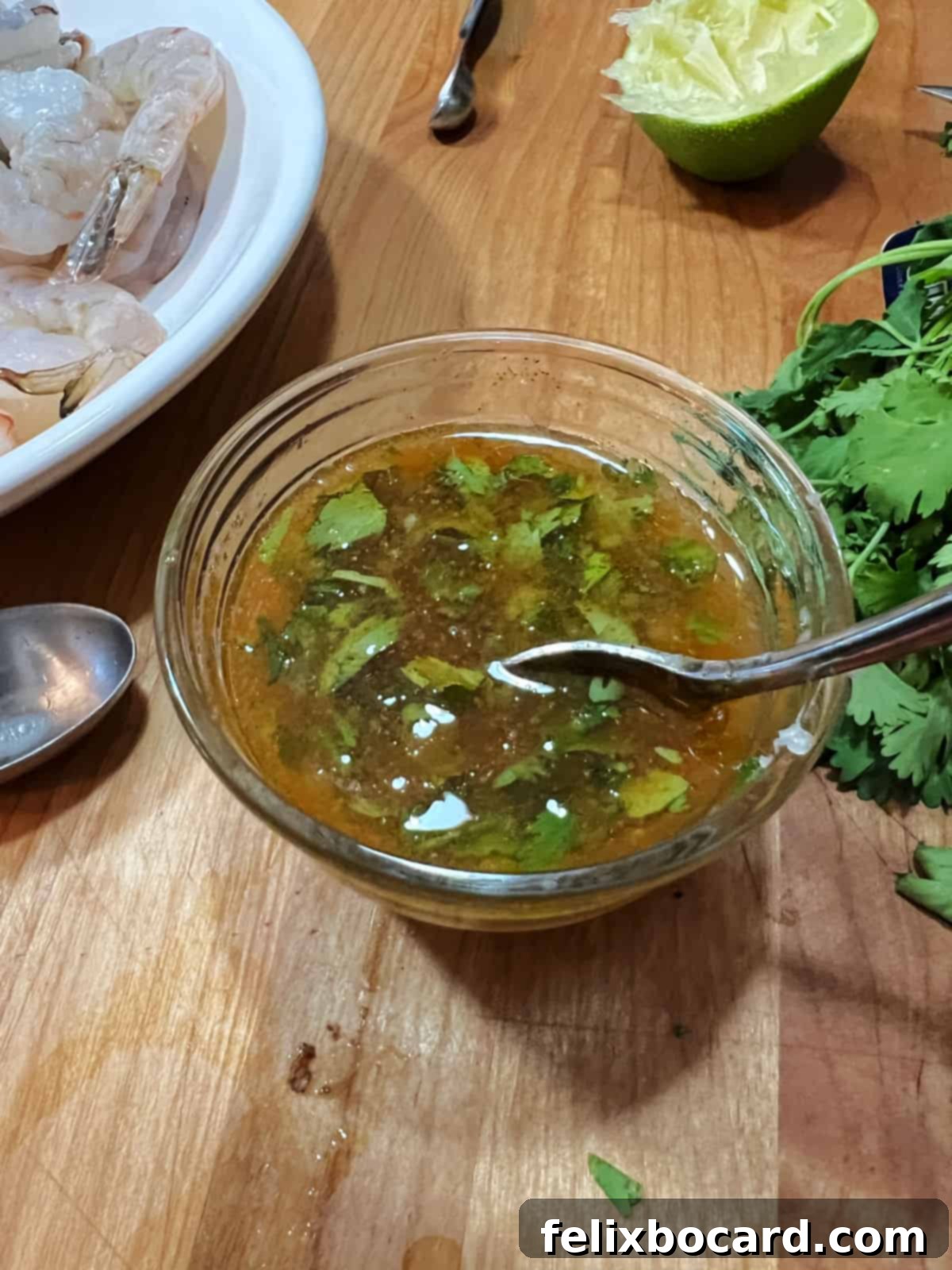 Fiesta Lime Grilled Shrimp Skewers 4 Marinade in a small cup.