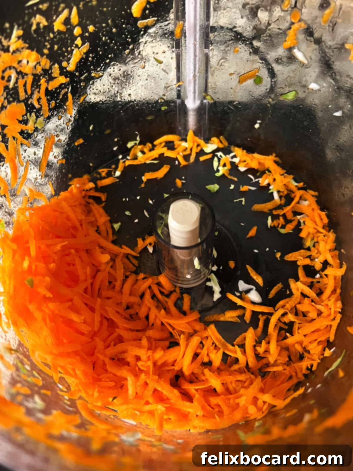 Brussels Sprouts and Cranberry Salad 5 Close-up of shredded carrots, adding a pop of color and sweetness to the Brussels sprouts salad.