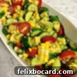 close up of corn tomato avocado salad