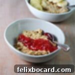 A square image of creamy peanut butter overnight oats, garnished with either jam or banana slices, highlighting a perfect quick and healthy breakfast.