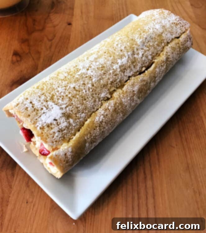 Strawberry Shortcake Swirl 5 Unwrapped strawberry shortcake roll holding together after chilling