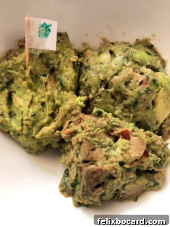 Final comparison of guacamole after refrigeration, showing untreated, plastic-wrapped, and Fruit Fresh portions