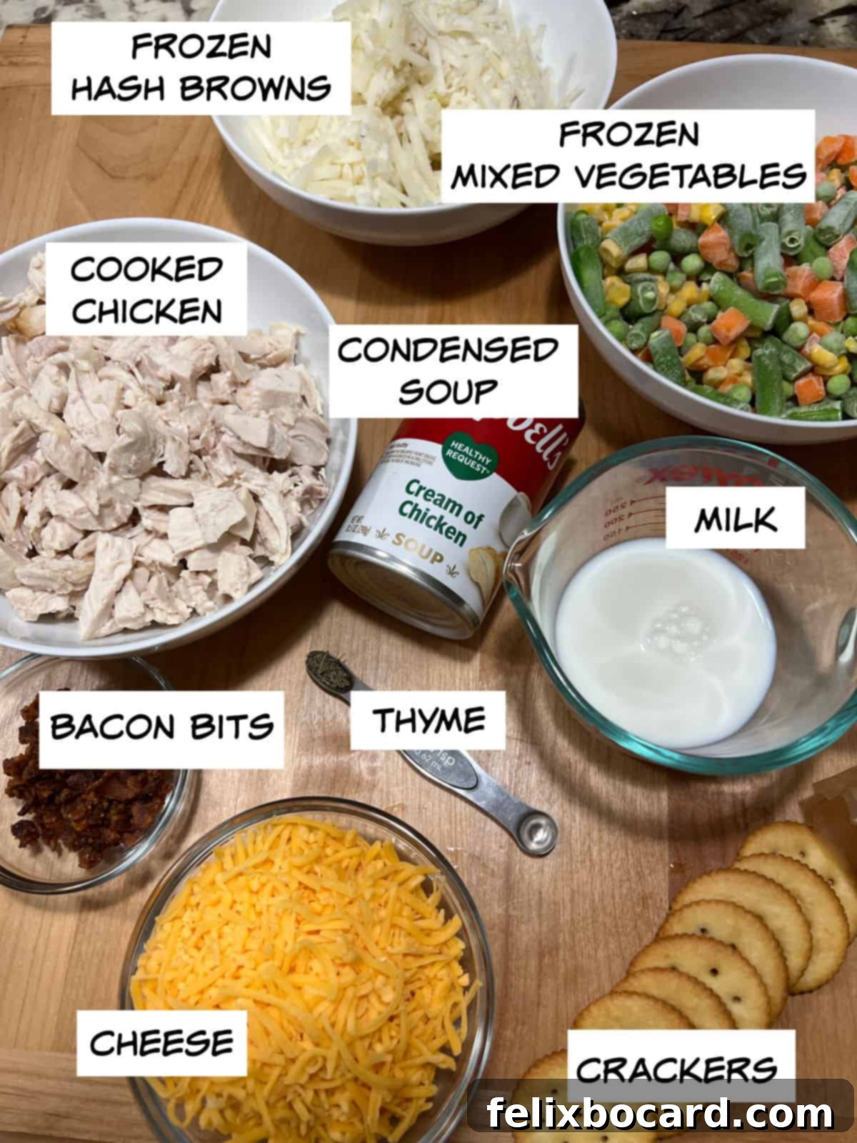 Ingredients: hash browns, cooked chicken, frozen vegetables, milk, condensed soup, bacon bits, cheese, crackers, and thyme.