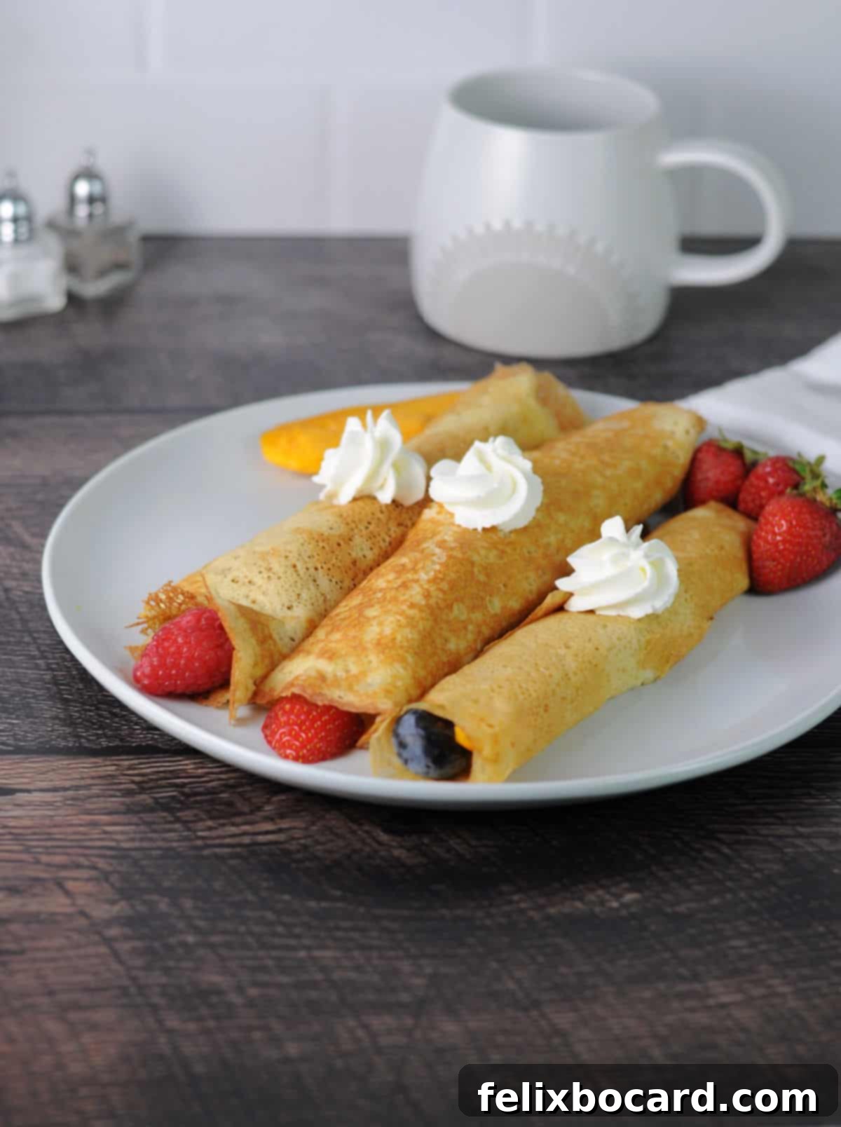 A stack of golden crepes made from pancake mix, ready to be filled and enjoyed.