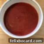 Delicious strawberry cake filling, perfect for layering in cakes and desserts.