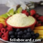 Sweet Cloud Fruit Dip 6 Delicious Cool Whip 2-ingredient Fruit Dip surrounded by an assortment of fresh, colorful fruits.