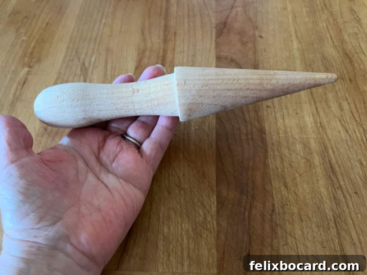 Norwegian Christmas Krumkake 5 Cone-shaped wooden tool for rolling warm Krumkake cookies into their iconic shape.