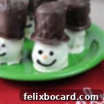 Snowman Oreo Truffles 12 close up of a snowman oreo ball.