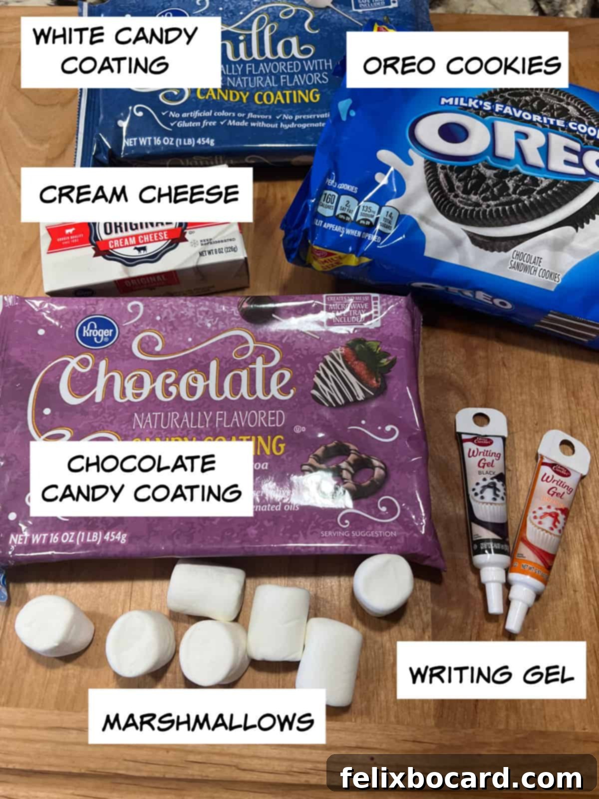 Snowman Oreo Truffles 3 ingredients: white candy coating, chocolate candy coating, oreo cookies, cream cheese, marshmallows, writing gel.