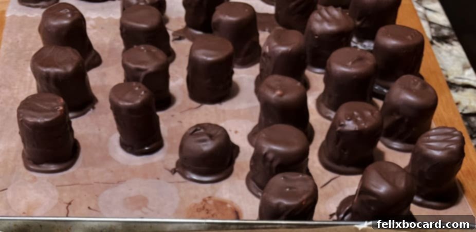 Snowman Oreo Truffles 6 chocolate coated marshmallow hats.