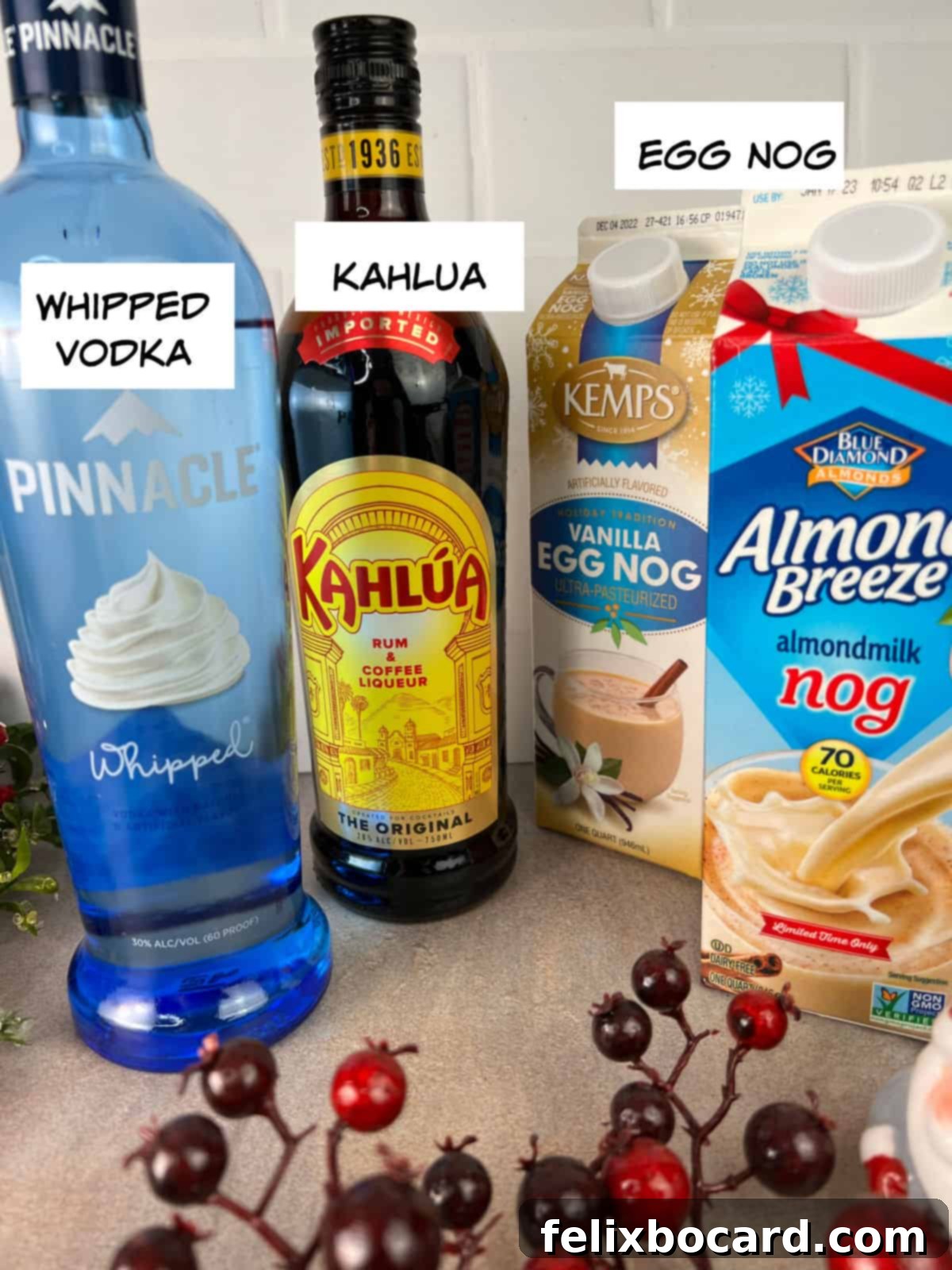 Yuletide White Russian 3 Essential ingredients for an Eggnog White Russian: whipped vodka, Kahlua, and a carton of eggnog.