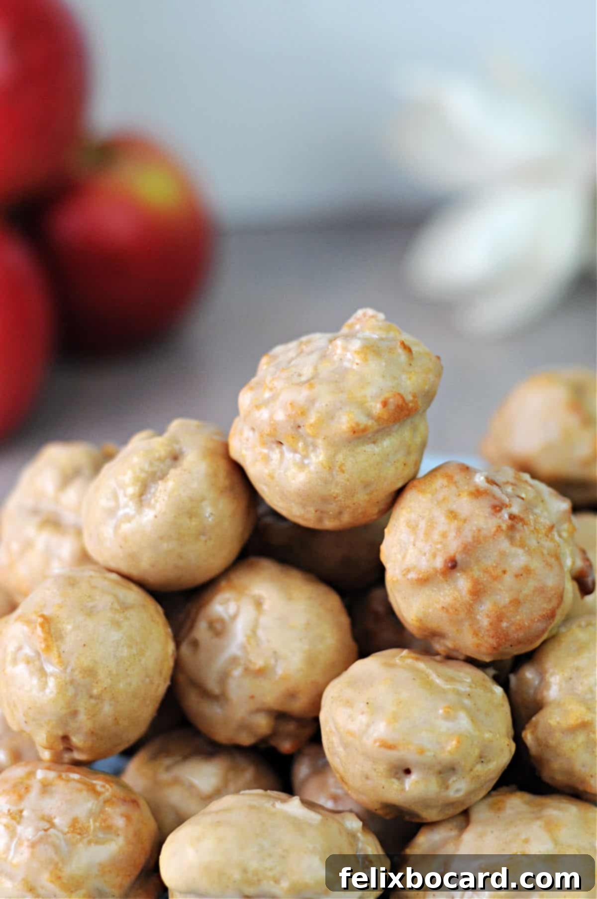 close up of glazed donut holes.
