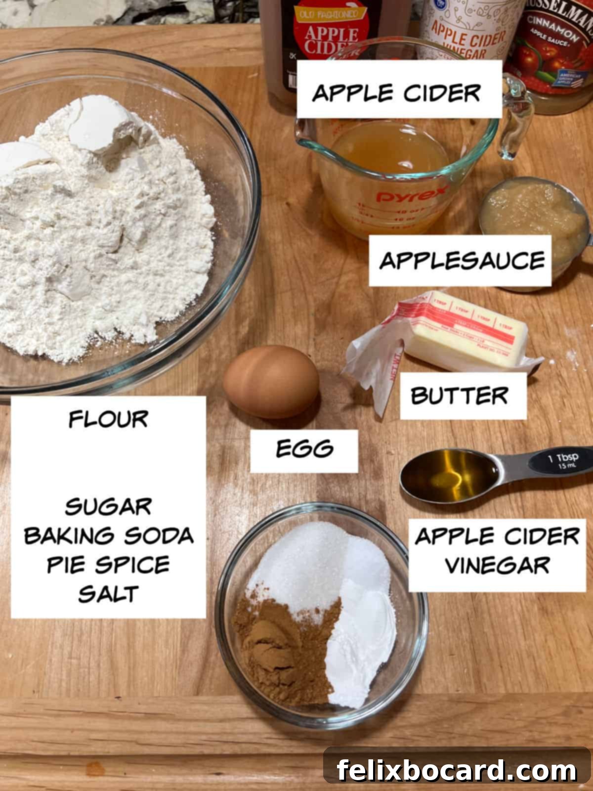 ingredients: apple cider, applesauce, butter, egg, apple cider vinegar, flour, sugar, baking soda, pie spice, salt.