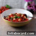 grape tomato mozzarella salad in a serving bowl