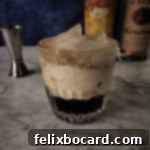 Velvet Vodka Dream 3 Classic White Russian cocktail with cream, coffee liqueur, and vodka, garnished.